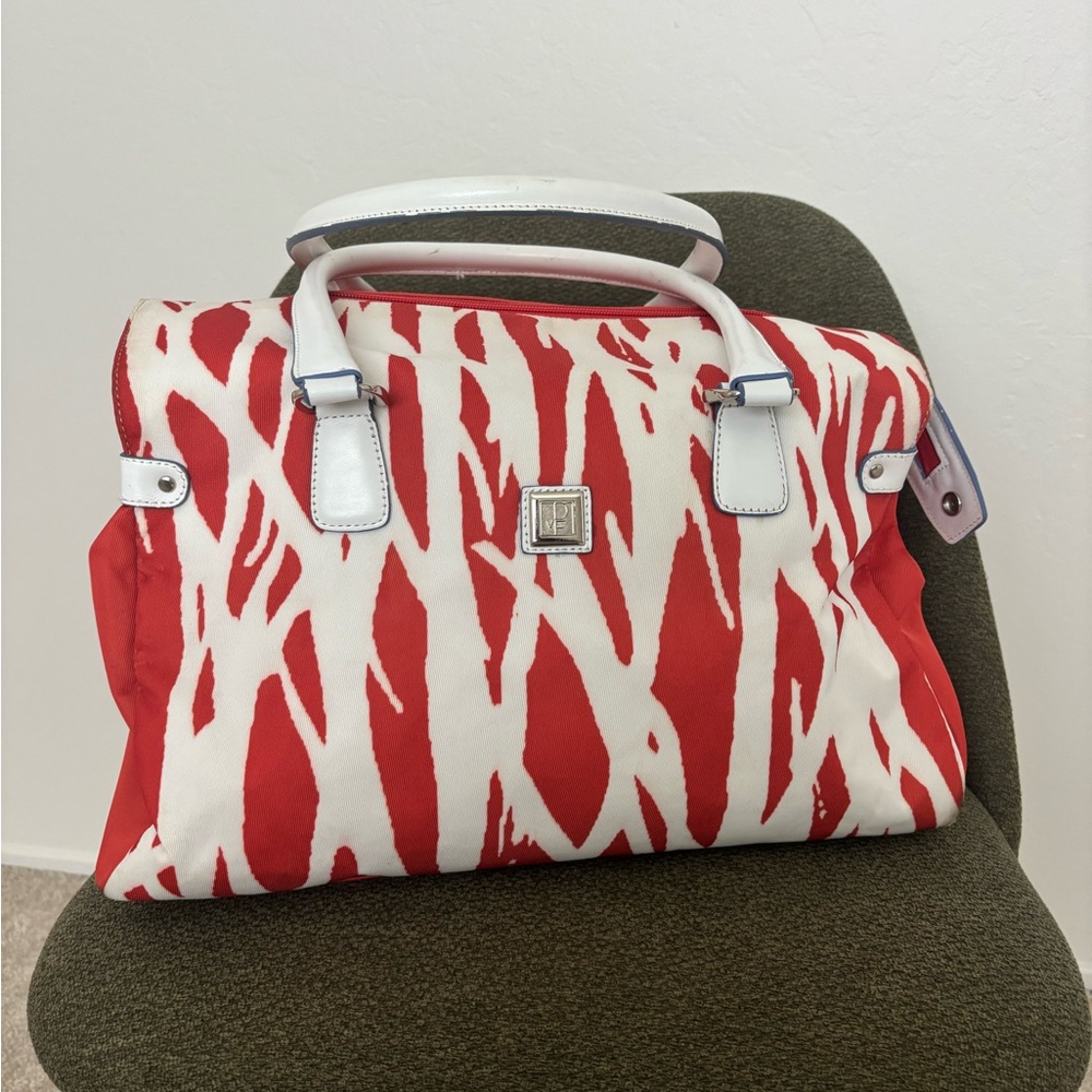 Diane Von Furstenberg orange and white carry on luggage